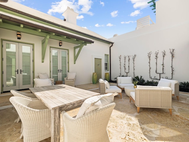 view of patio featuring french doors and outdoor lounge area