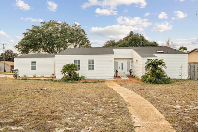 view of front of home with a front lawn