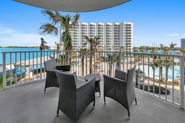 balcony featuring a water view