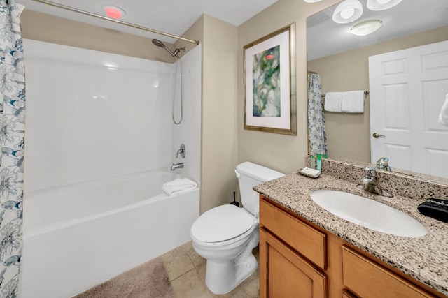 full bathroom featuring tile patterned flooring, shower / bath combination with curtain, vanity, and toilet