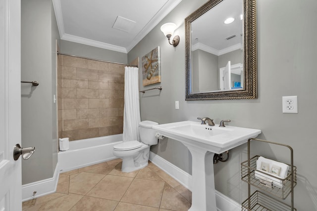 full bathroom featuring tile patterned flooring, toilet, shower / bath combo with shower curtain, and crown molding