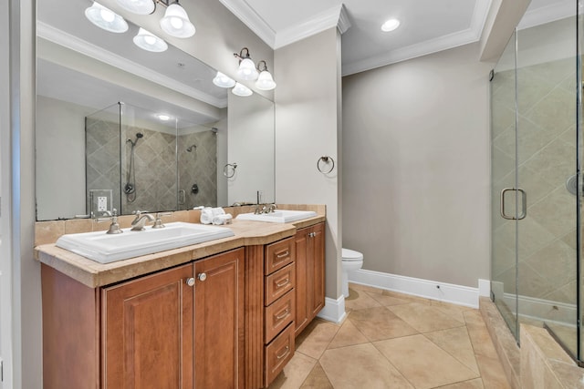 bathroom featuring vanity, tile patterned floors, toilet, ornamental molding, and walk in shower