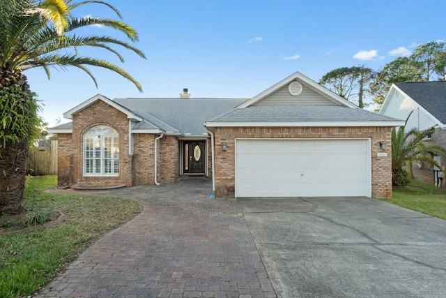 ranch-style home with a garage