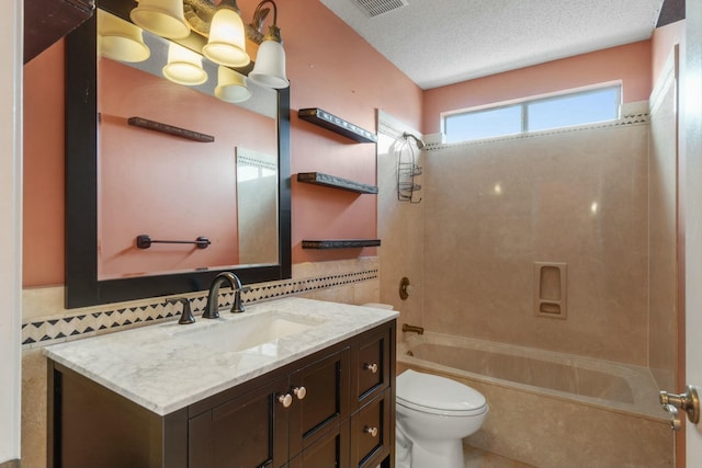 full bathroom featuring a textured ceiling, vanity, tasteful backsplash, and shower / bathtub combination