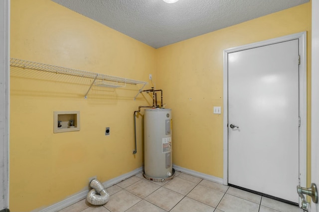 clothes washing area featuring washer hookup, light tile patterned floors, a textured ceiling, water heater, and hookup for an electric dryer