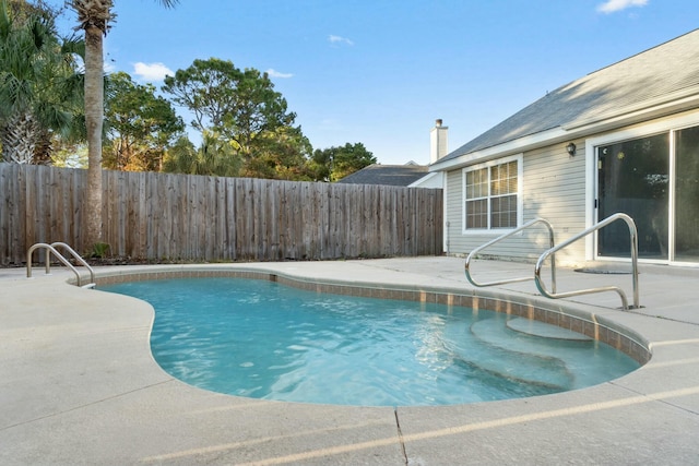 view of pool with a patio area