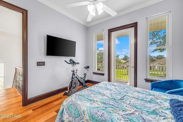 bedroom with ceiling fan, ornamental molding, hardwood / wood-style flooring, and access to exterior