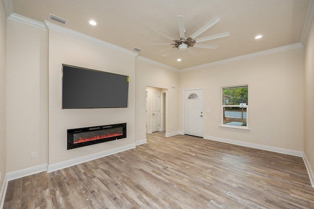 unfurnished living room featuring crown molding, light hardwood / wood-style flooring, and ceiling fan