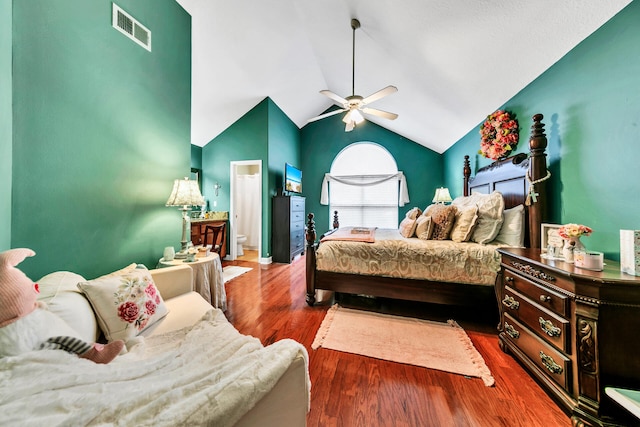 bedroom with ceiling fan, lofted ceiling, and hardwood / wood-style flooring