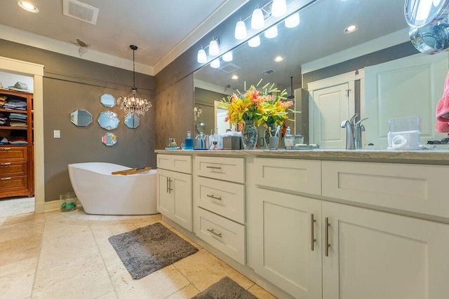 bathroom featuring a tub to relax in, vanity, ornamental molding, and an inviting chandelier