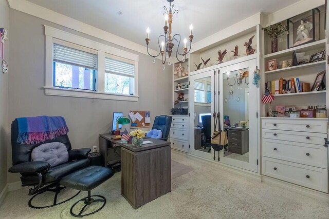 office area with a notable chandelier and light carpet