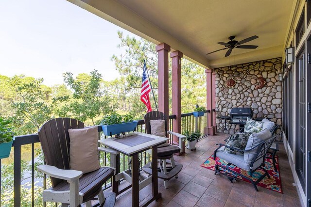 view of patio featuring ceiling fan