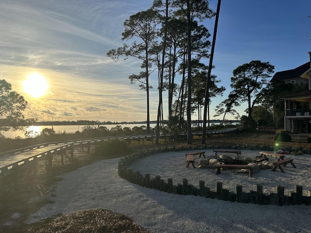 water view with an outdoor fire pit