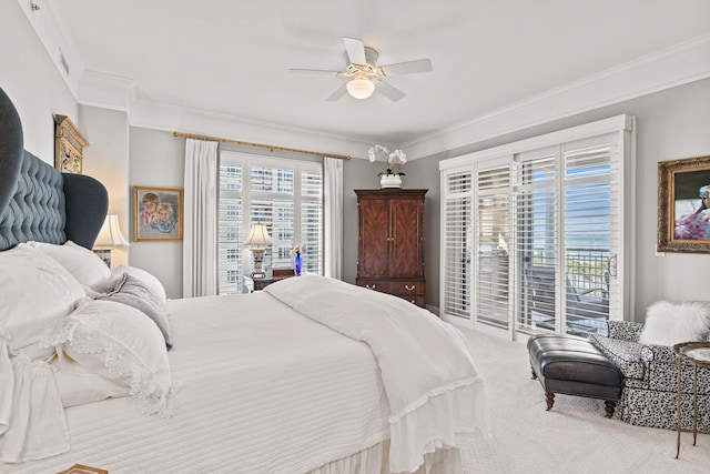 carpeted bedroom with access to exterior, ornamental molding, and ceiling fan