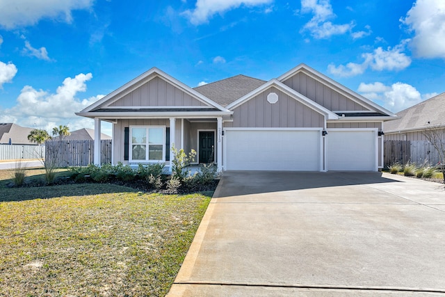 view of front facade with a front lawn and a garage