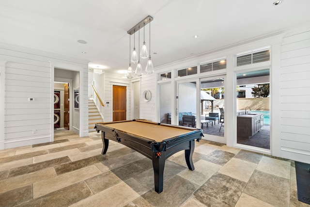 rec room featuring wooden walls, sink, ornamental molding, and billiards