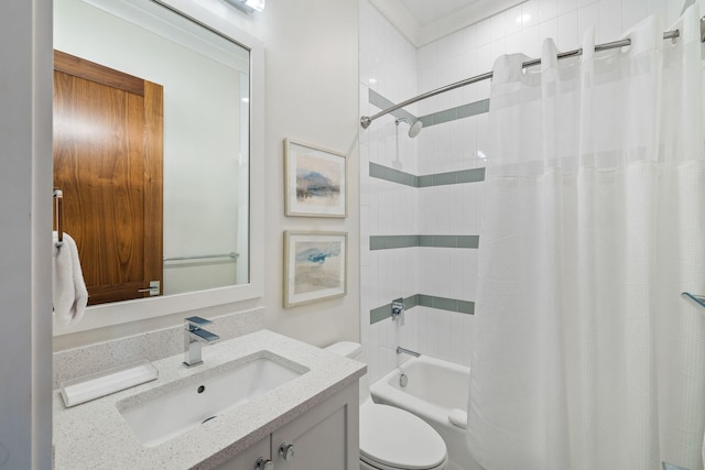 full bathroom featuring shower / tub combo, vanity, and toilet