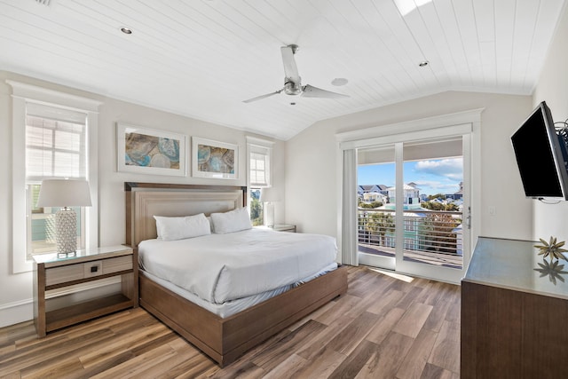 bedroom with access to exterior, ceiling fan, hardwood / wood-style floors, vaulted ceiling, and wood ceiling