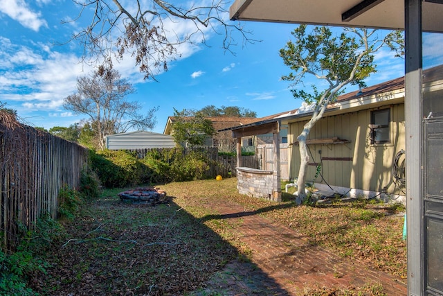 view of yard with a fenced backyard