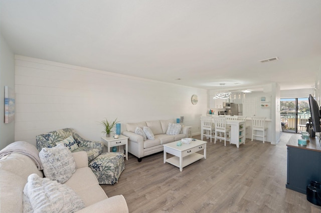 living room with wood-type flooring