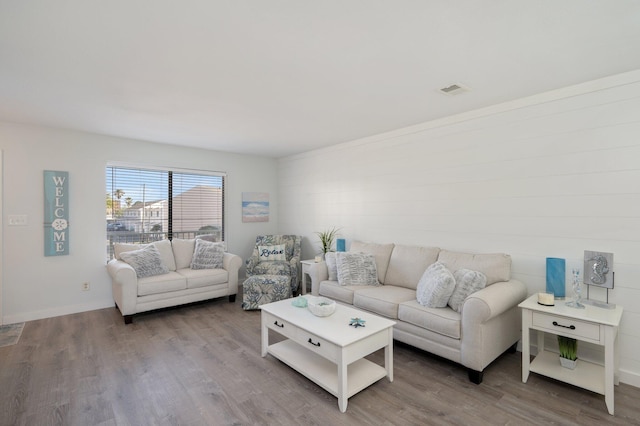 living room with wood-type flooring