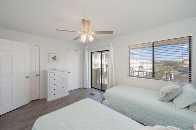 bedroom with hardwood / wood-style flooring and ceiling fan