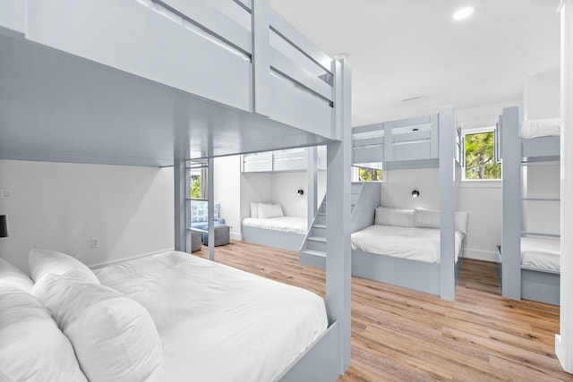 bedroom with light hardwood / wood-style floors