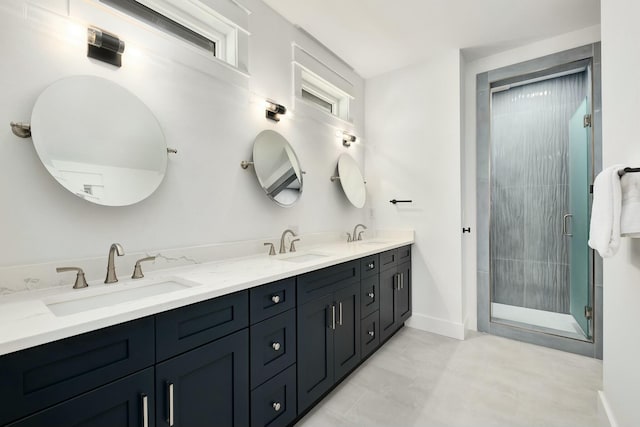 bathroom with vanity and walk in shower