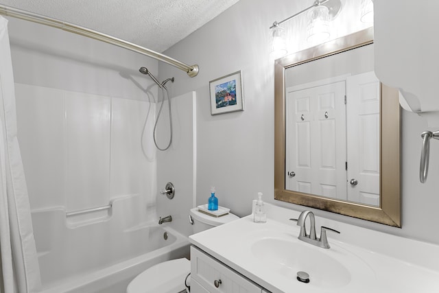 144 Spires Ln Unit 114, Santa Rosa Beach, FL 32459 - full bathroom with shower / bath combination with curtain, vanity, toilet, and a textured ceiling