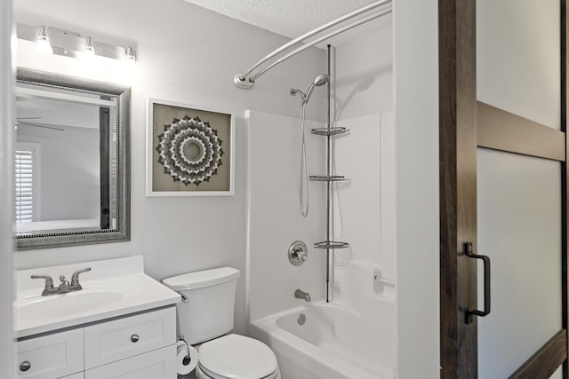 144 Spires Ln Unit 114, Santa Rosa Beach, FL 32459 - full bathroom with vanity, toilet, shower / bathing tub combination, and a textured ceiling