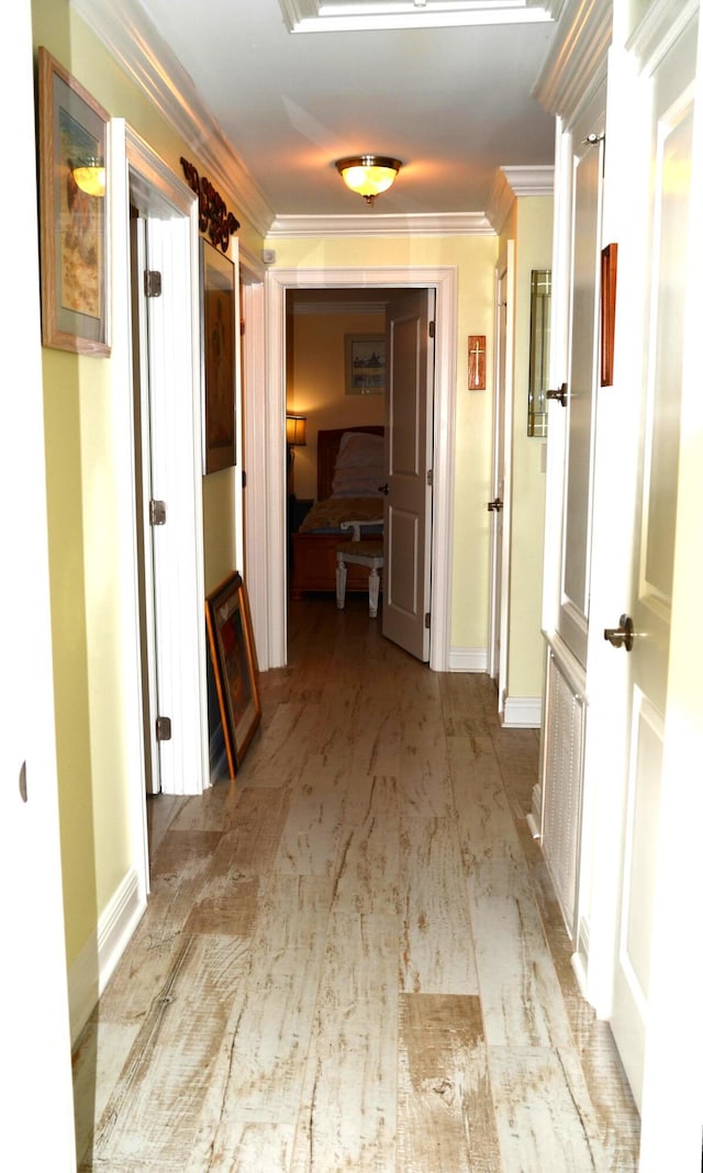 501 Benning Dr, Destin, FL 32541 - hallway featuring crown molding and light hardwood / wood-style floors