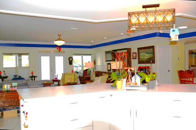 501 Benning Dr, Destin, FL 32541 - kitchen with decorative light fixtures, french doors, and ornamental molding