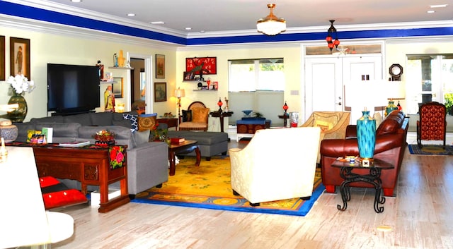 501 Benning Dr, Destin, FL 32541 - living room featuring light wood-type flooring, french doors, and ornamental molding