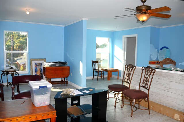 501 Benning Dr, Destin, FL 32541 - interior space with ceiling fan, crown molding, and light hardwood / wood-style floors