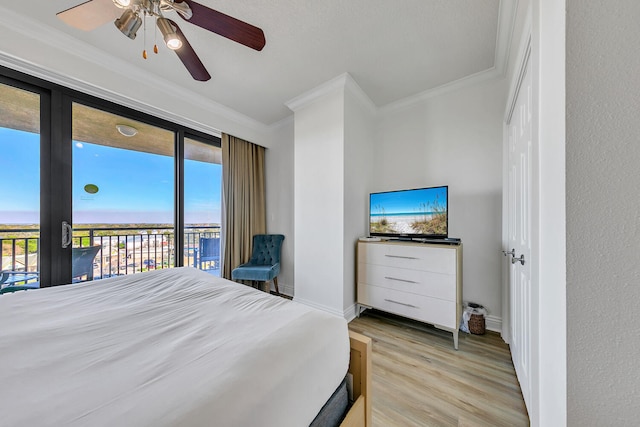 bedroom with access to outside, ceiling fan, light hardwood / wood-style flooring, and crown molding