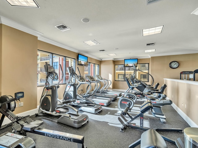 gym featuring ornamental molding