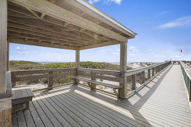 wooden terrace with a water view