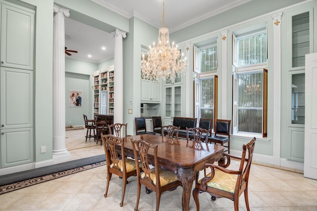 dining room featuring ceiling fan, ornate columns, ornamental molding, and light tile patterned floors