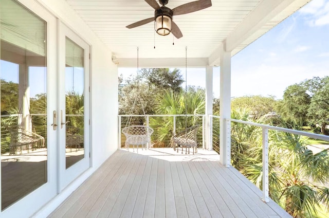 wooden deck featuring french doors