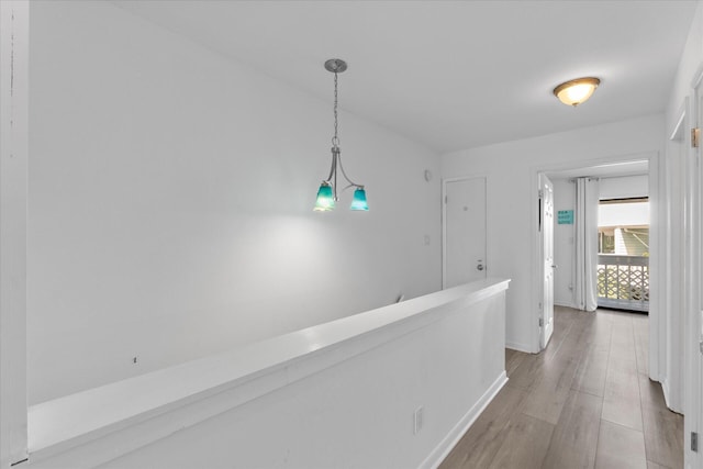 hallway featuring light hardwood / wood-style flooring