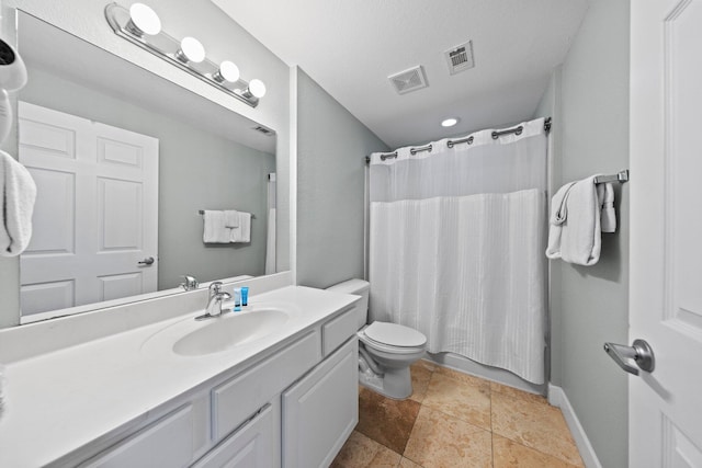 full bathroom with vanity, toilet, and shower / bath combo