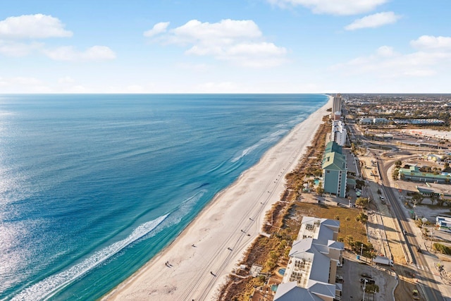 drone / aerial view with a view of the beach and a water view