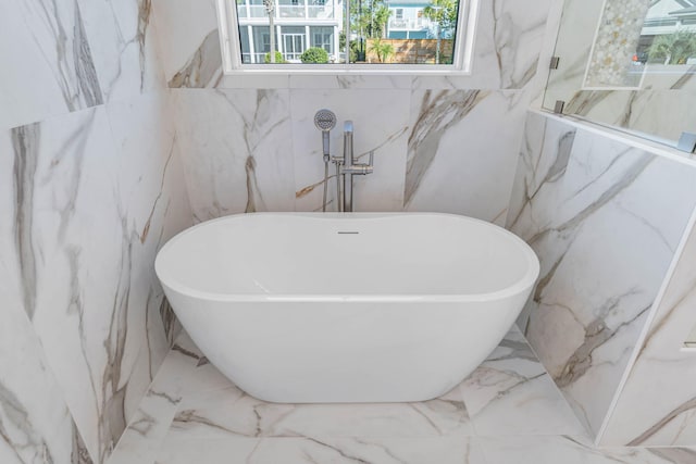 bathroom with a washtub