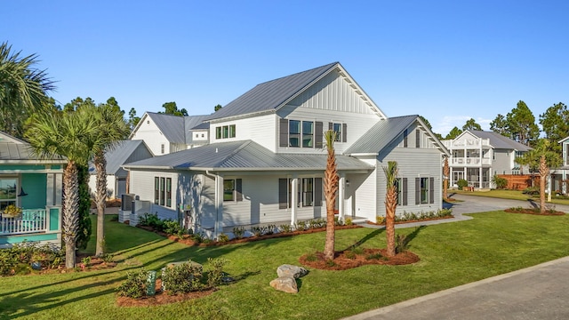 view of front of home with a front lawn