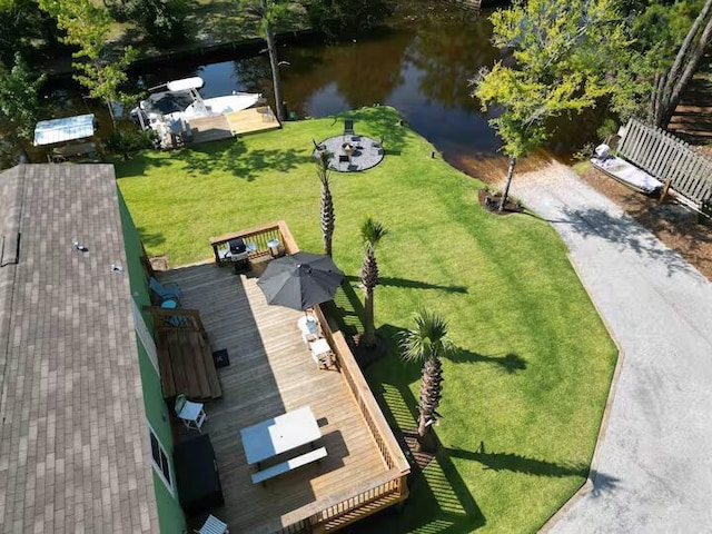 bird's eye view with a water view