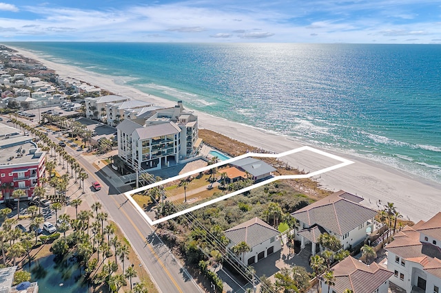 aerial view featuring a view of the beach and a water view