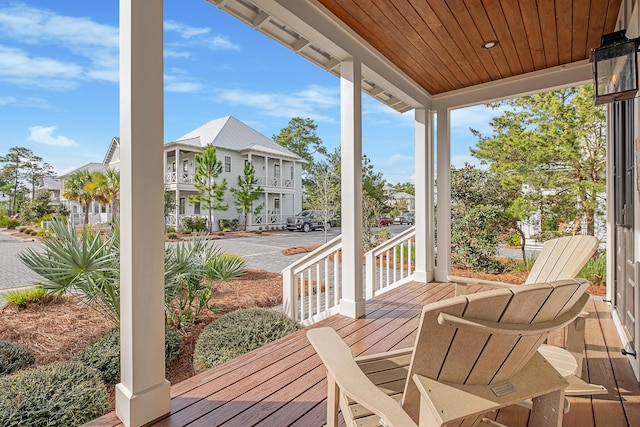 wooden terrace featuring a porch