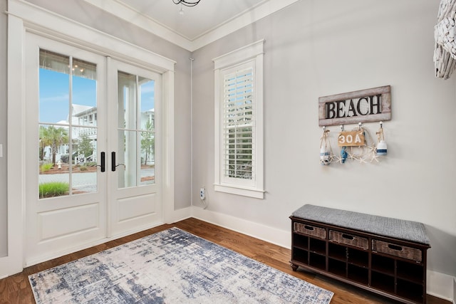 doorway to outside with crown molding, french doors, and hardwood / wood-style flooring