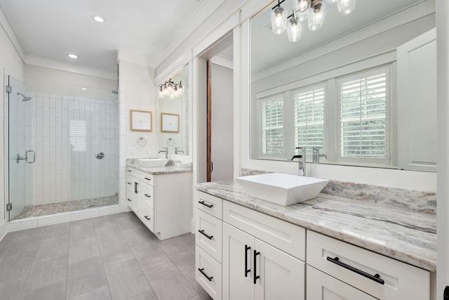 bathroom featuring crown molding, tile patterned flooring, vanity, and walk in shower