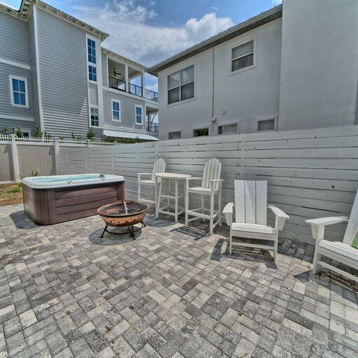 view of patio / terrace with an outdoor fire pit